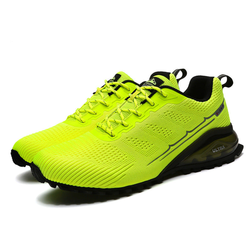 Mens Outdoor Sneakers in bright lime green with black lining and contrasting black soles, displayed as a pair.