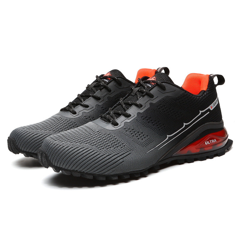 Mens Outdoor Sneakers in grey and black with orange lining and heel accents, displayed as a pair.
