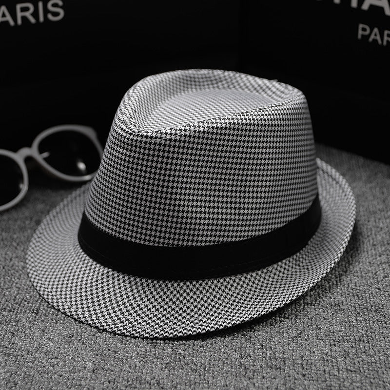 Mens Patterned Cotton Linen Hats in black and white houndstooth, angled view showing the shaped crown, surrounding brim and black hatband