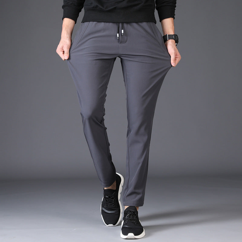 Mens Slim Fit Trousers in grey shown from the front with side pockets