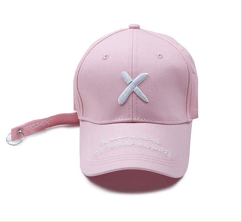 Unisex Embroidered Baseball Cap in pink with light X embroidery, matching ventilation eyelets and a curved peak.