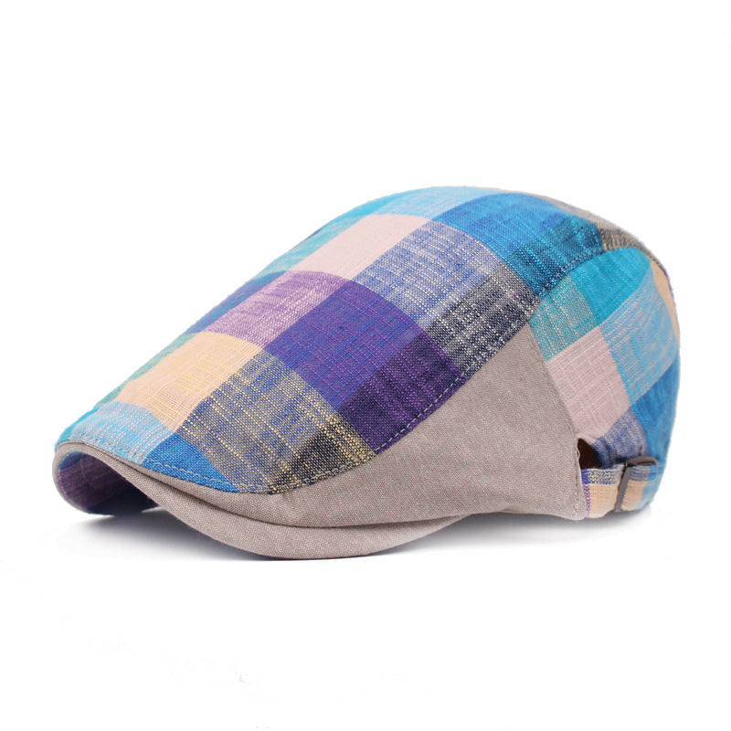 Unisex Plaid Flat Cap in Blue shown at an angle, displaying the sloping checked crown and contrasting beige panels.