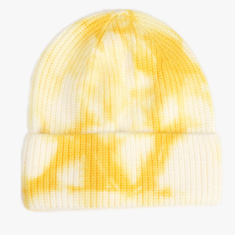 Unisex Tie Dye Beanie in Yellow and cream, front view showing the ribbed knit, rounded crown and folded cuff