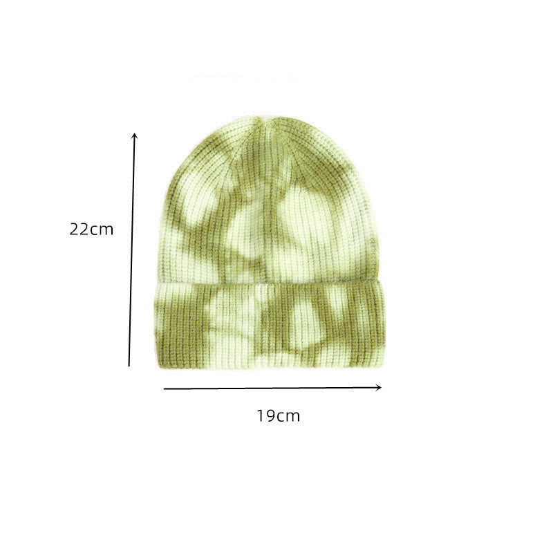 Unisex Tie Dye Beanie size guide showing the green patterned hat with approximately 22 cm height and 19 cm flat width