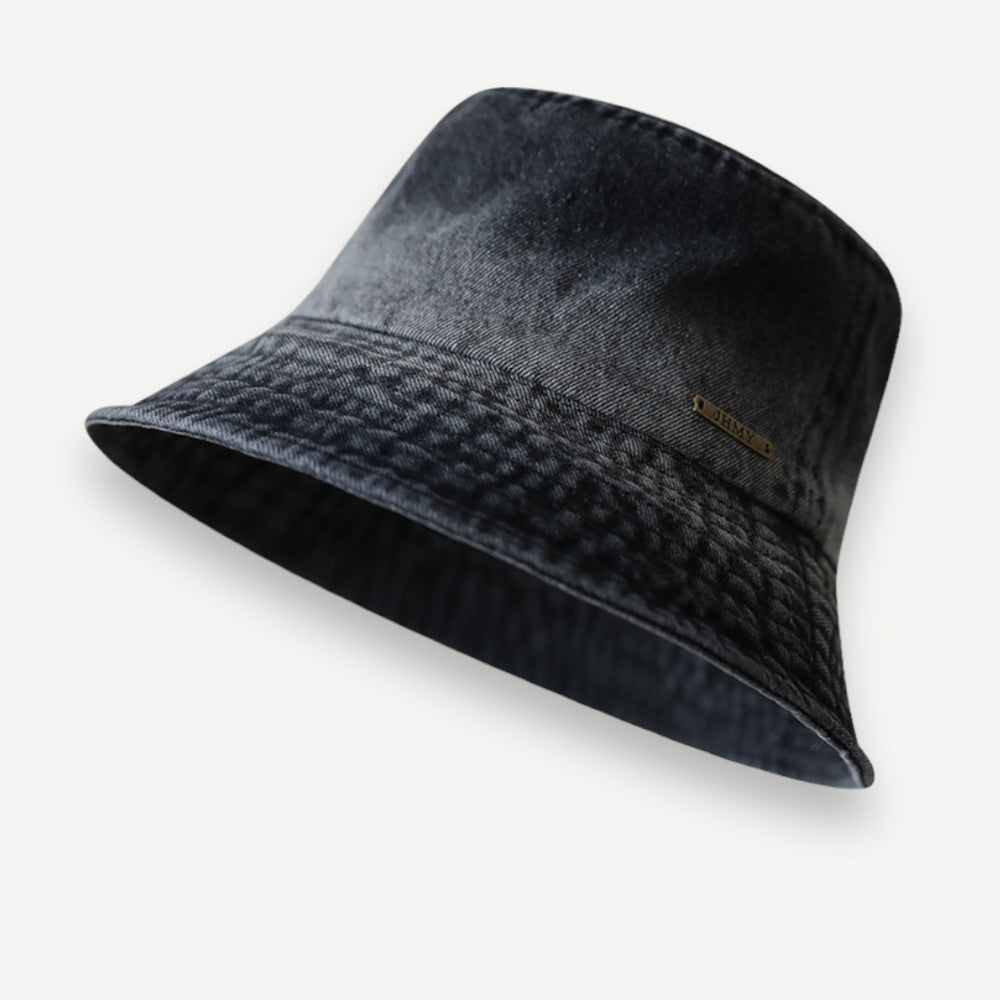 Vintage Washed Bucket Hat in black with a faded finish, flat crown and short stitched brim.