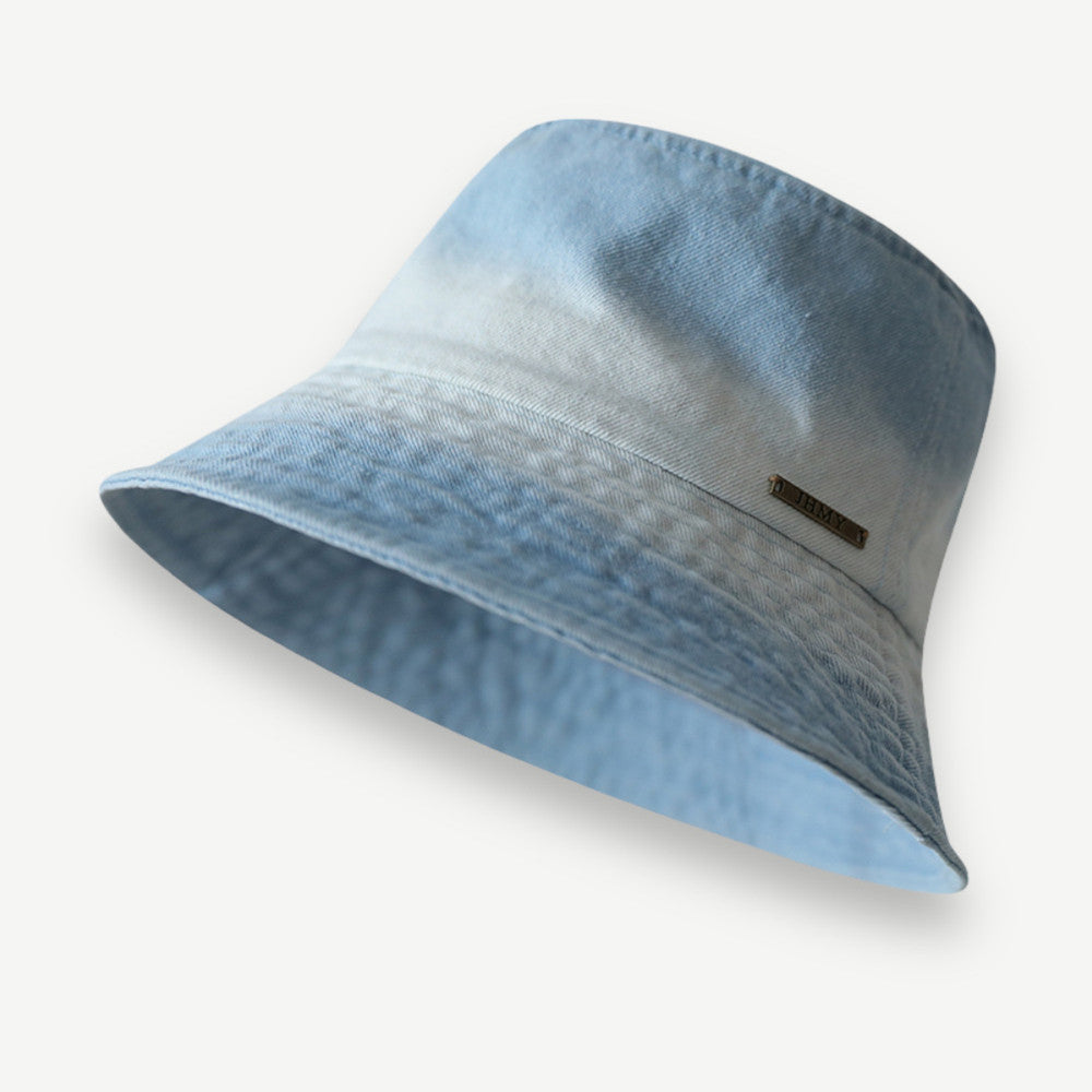 Vintage Washed Bucket Hat in light denim blue with a faded finish, flat crown and stitched brim.