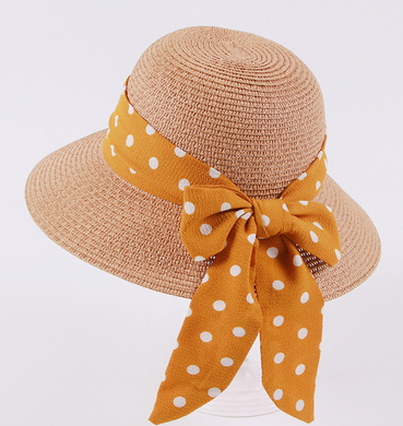 Womens Bow Sun Hat in camel with a mustard-coloured ribbon bow featuring white polka dots.