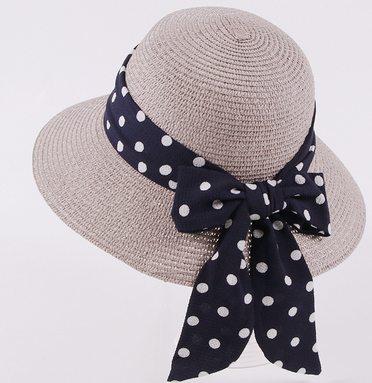 Womens Bow Sun Hat in grey with a dark ribbon bow featuring white polka dots.