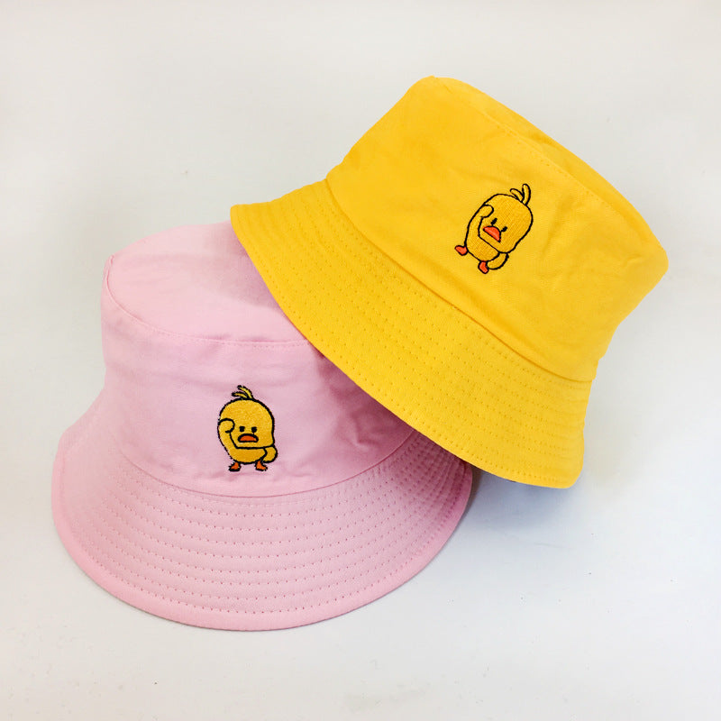 Womens Embroidered Bucket Hat shown in pink and yellow with matching duck embroidery and stitched brims.