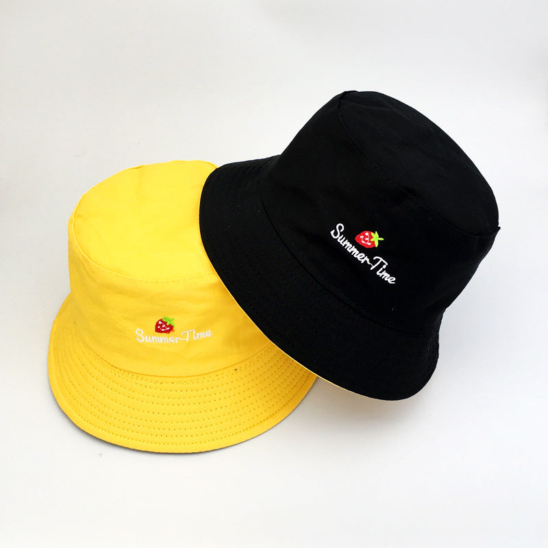 Womens Embroidered Bucket Hat shown in yellow and black with strawberry embroidery and Summer Time lettering.