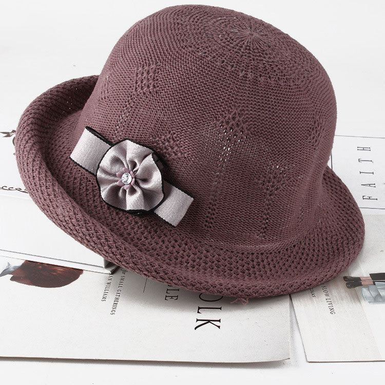 Womens Floral Knit Sun Hat in dark mauve with a curled brim and a contrasting silver-grey bow and rosette detail.
