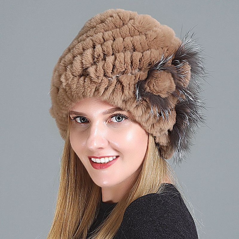 Womens Fur Knitted Hat in tan with textured rows and a contrasting brown side flower.