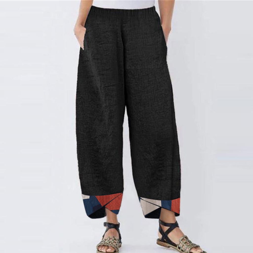 Womens Printed Cotton Trousers in black with an elastic waist and loose casual silhouette