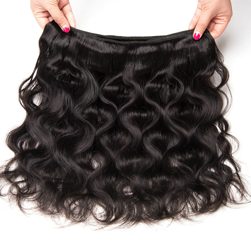 Curly Curtain Hair Extensions worn in long glossy body-wave styles