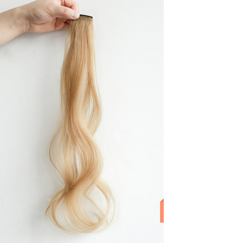 Curly Face-Framing Hair Extensions in yellow with soft curled ends