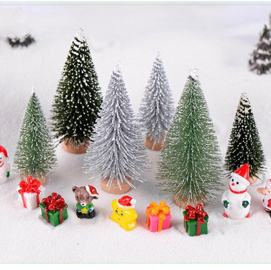 Mini festive Christmas trees with decorative ornaments and gifts, available in various sizes.