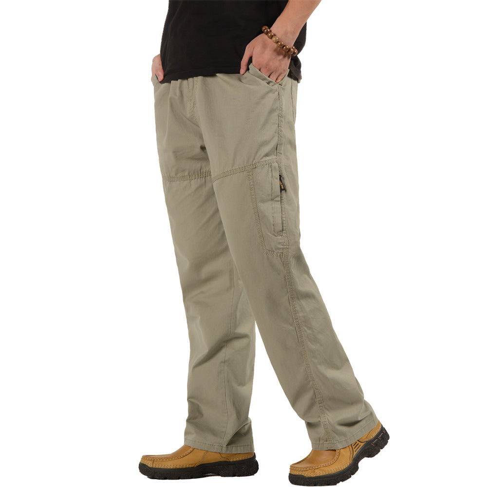 Mens Loose Fit Cotton Pants in light grey side view on model