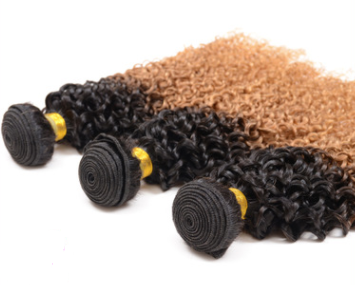 Ombre Curly Human Hair Extensions with dark roots and honey-blonde ends
