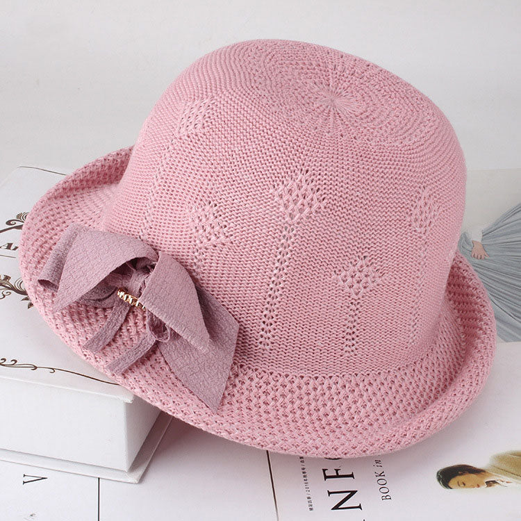 Womens Floral Knit Sun Hat in pink with a rounded crown, curled brim and a large matching bow.