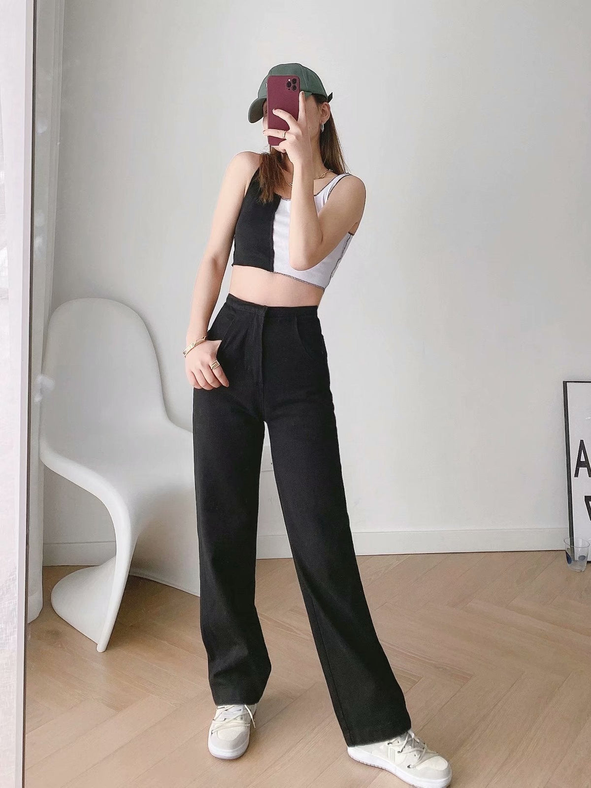 Womens Banana Pants in black shown from the front in a loose everyday fit