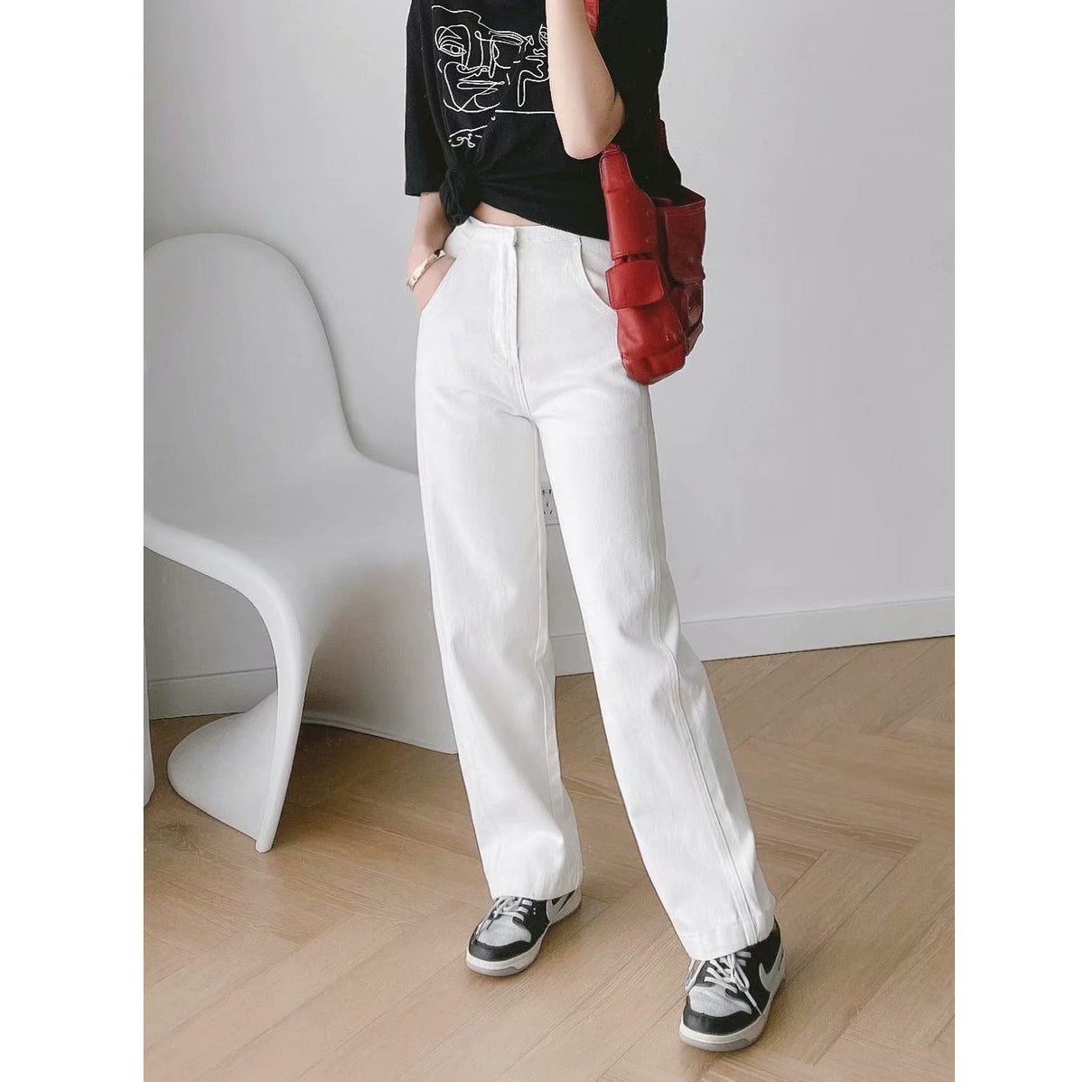 Womens Banana Pants in white shown in a relaxed full-length straight-leg outfit