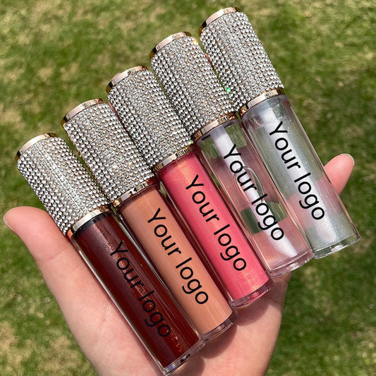 Custom branded lip gloss tubes with shimmer and matte options in various colors.