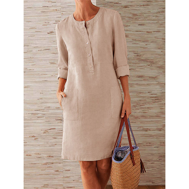 Elegant casual cotton dress for women in khaki color, modeled with rolled-up sleeves and stylish summer design.