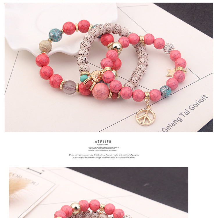 Beaded Charm Bracelet Set with pink beads and decorative charms