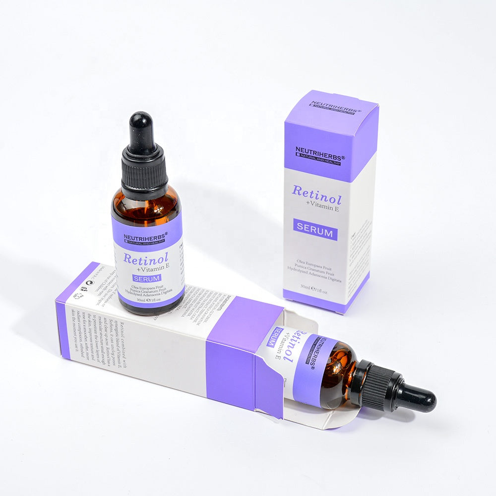 Retinol Vitamin E Serum bottle and purple product box display